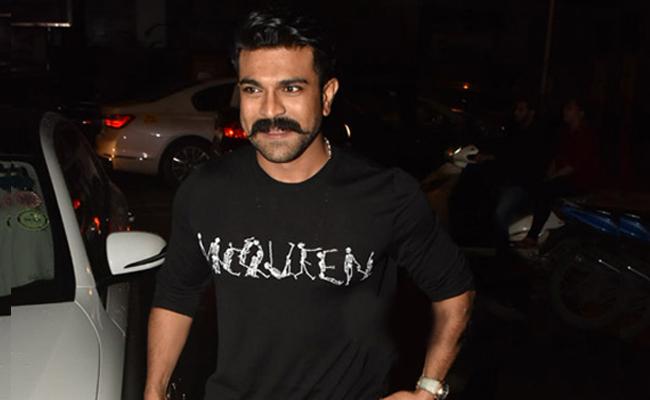 Charan Caught in New Look For RRR